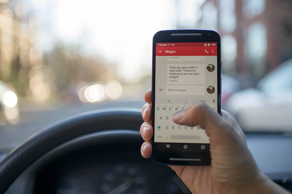using phone while driving illegal