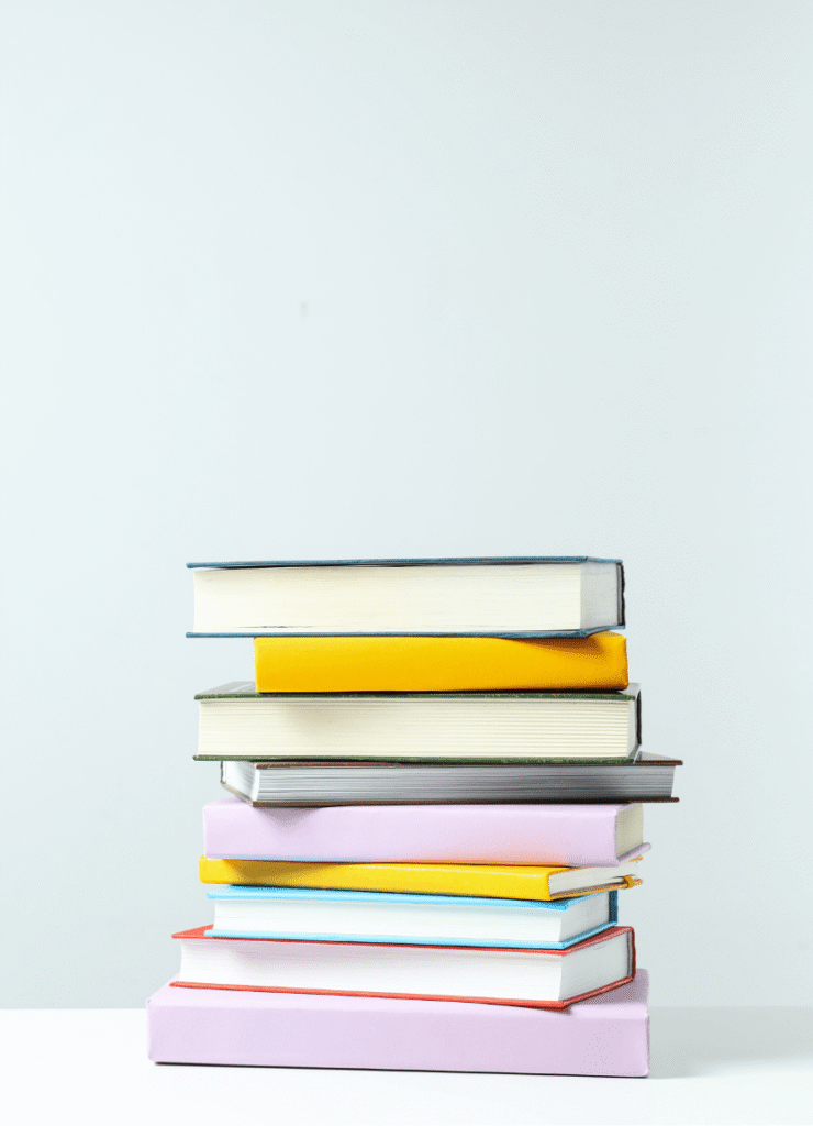 stack of multicoloured books